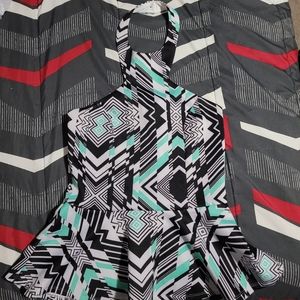 Classy multi colored top!  Guaranteed to turn heads. (M) Charlotte Russe.